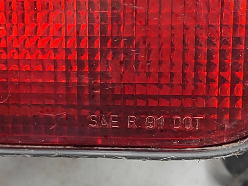 Mazda 323 1998 rear left side fog light 0498255L 